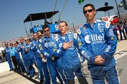 The Alltel crew stands at attention for the National Anthem at Richmond